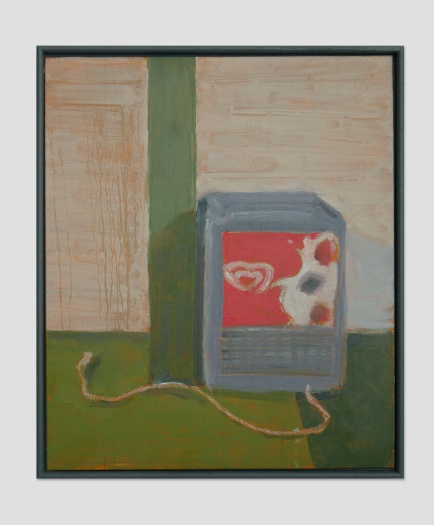 photograph of a paint of a television on a green floor