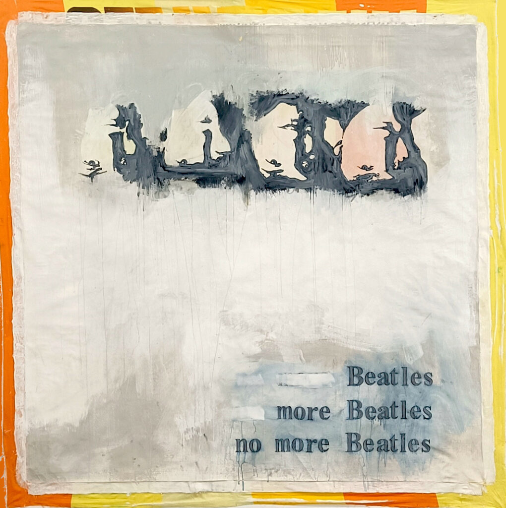 A painting with the Beatles heads upside down and text that says no more Beatles. 