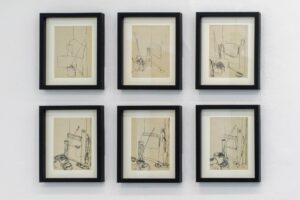 Six framed drawings on newsprint