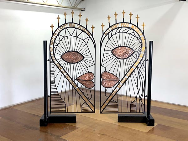 Katie Surridge, Mates gates, 2023, Forged and welded steel, copper and text from online dating messages. Artists own image.