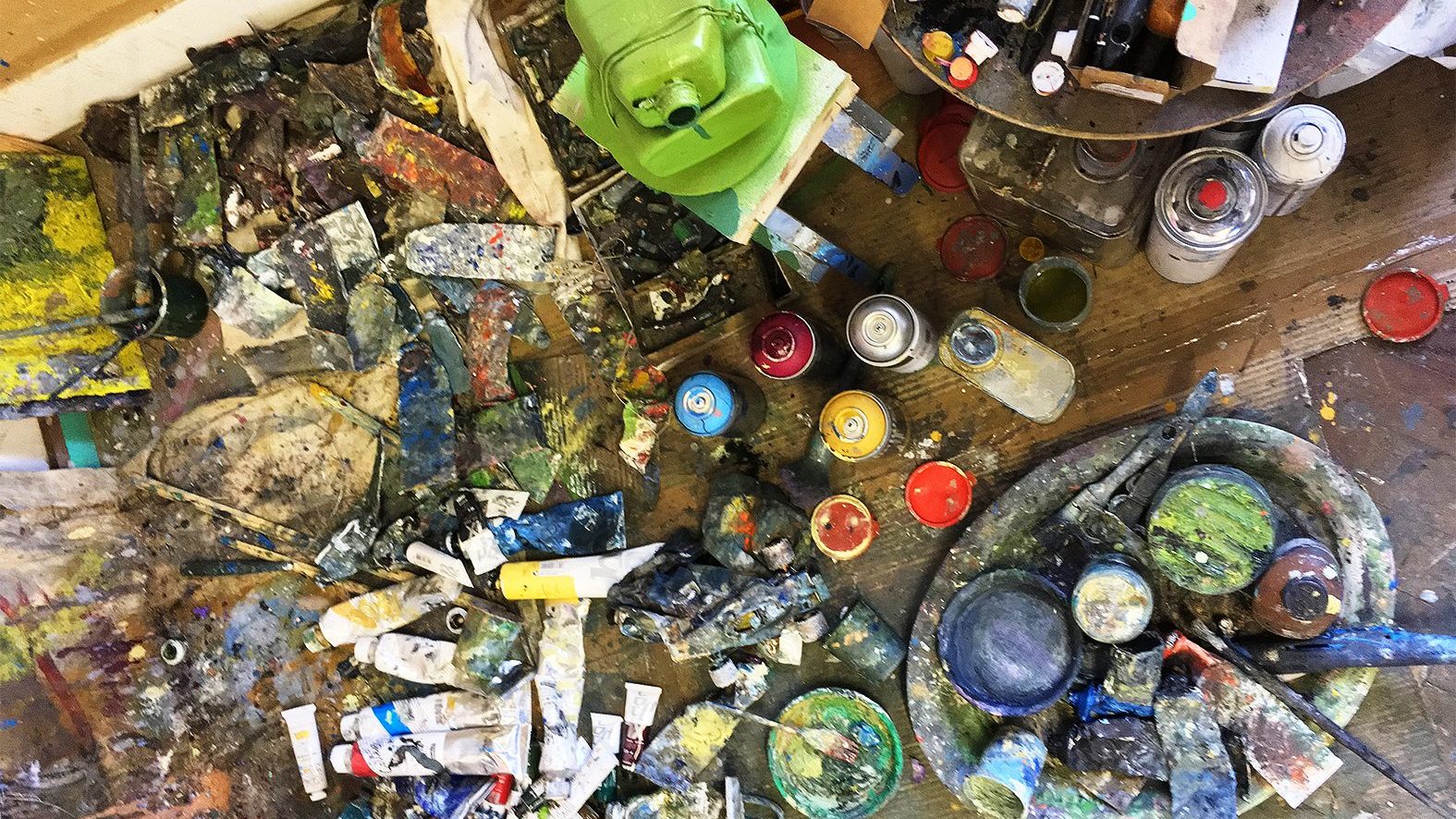 Paint and pots in an artist studio