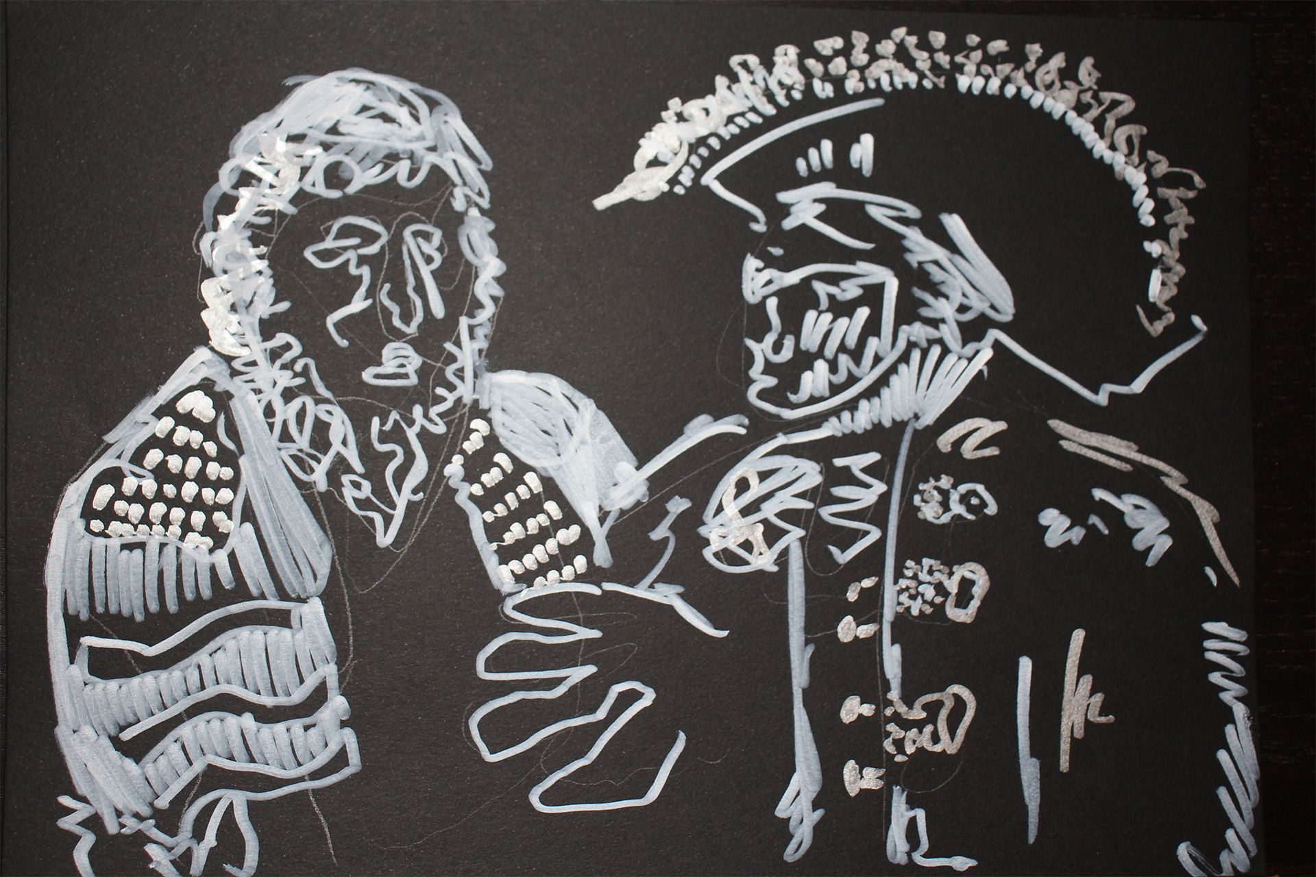 A white drawing of two people on black background