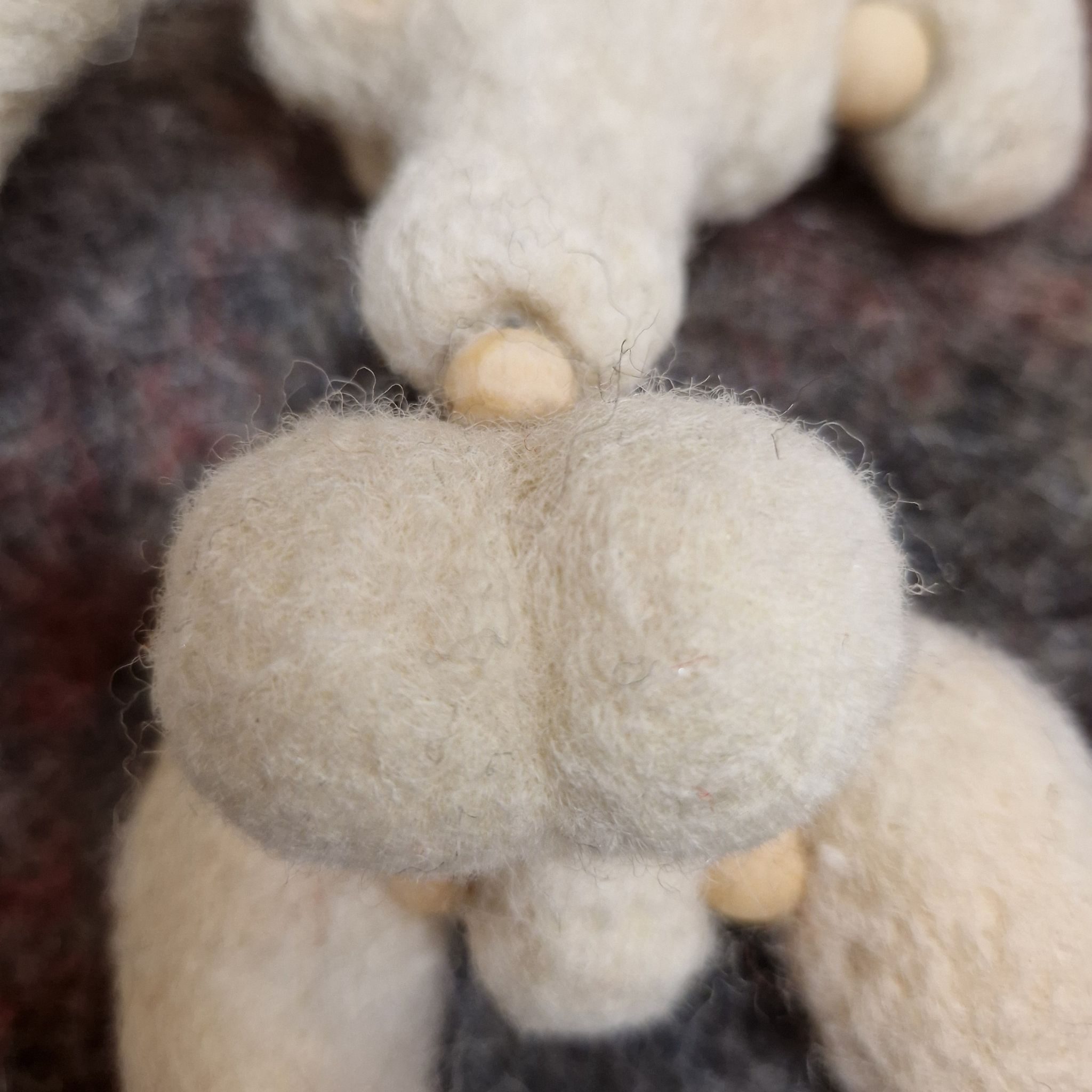 Needle felted puppet's bottom