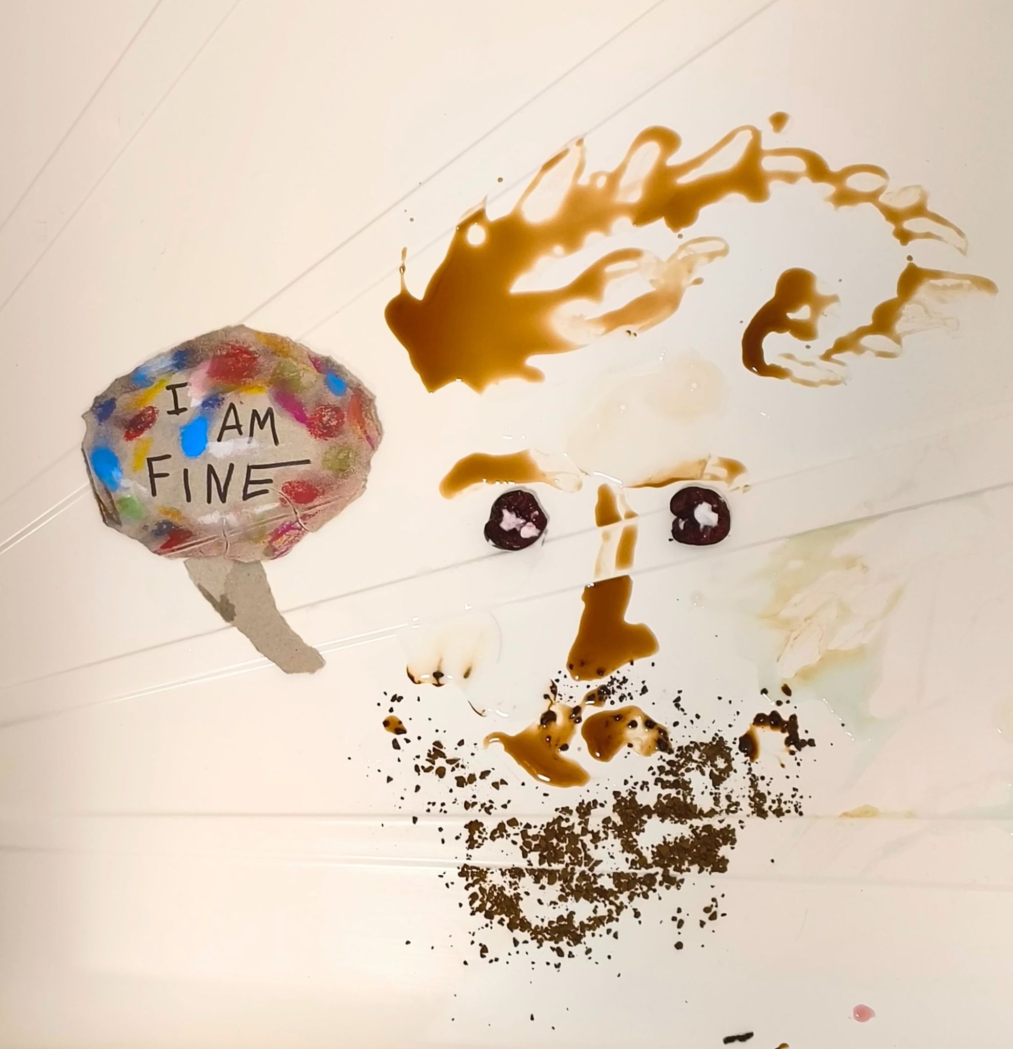 A self portrait using cough medicine, cherries and coffee