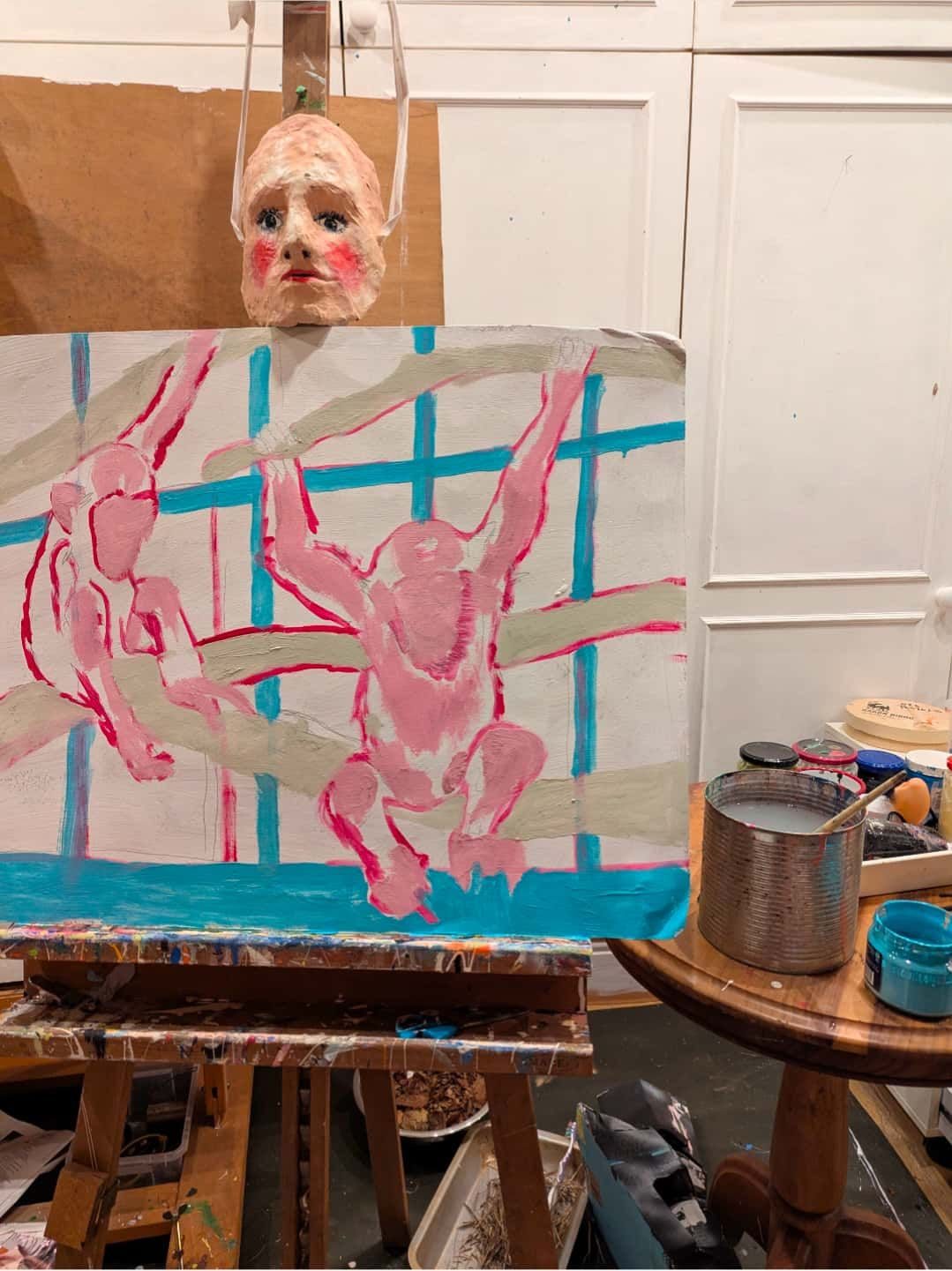 Painting of monkeys and a human mask