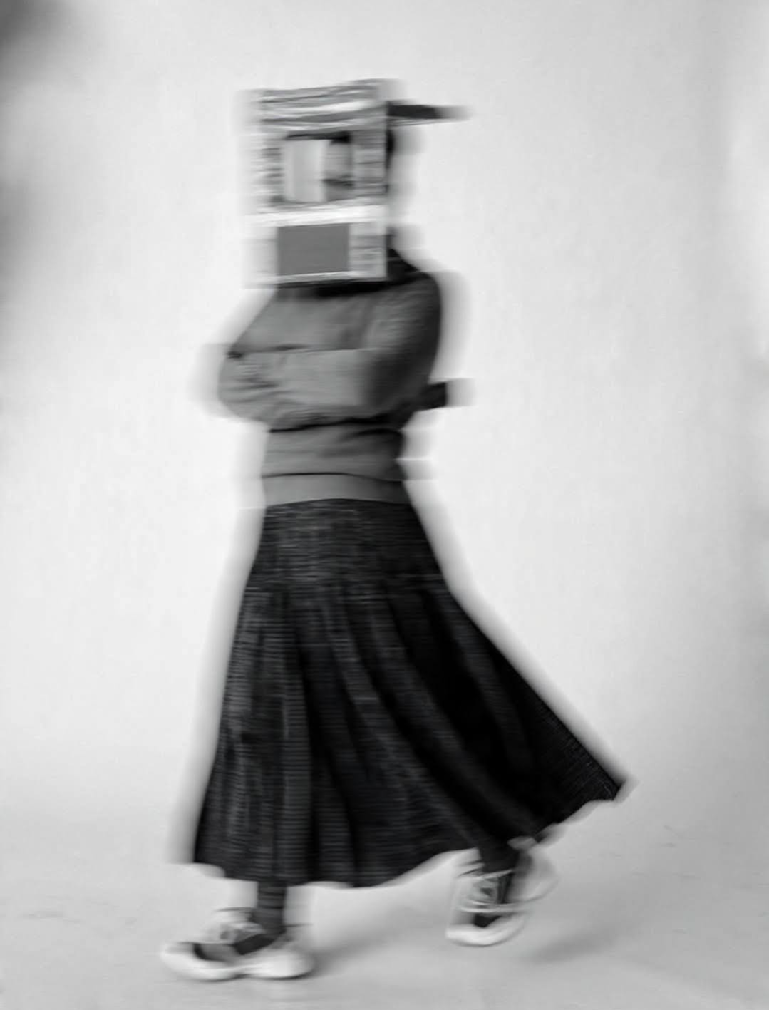 Photograph of a person in motion wearing a mask
