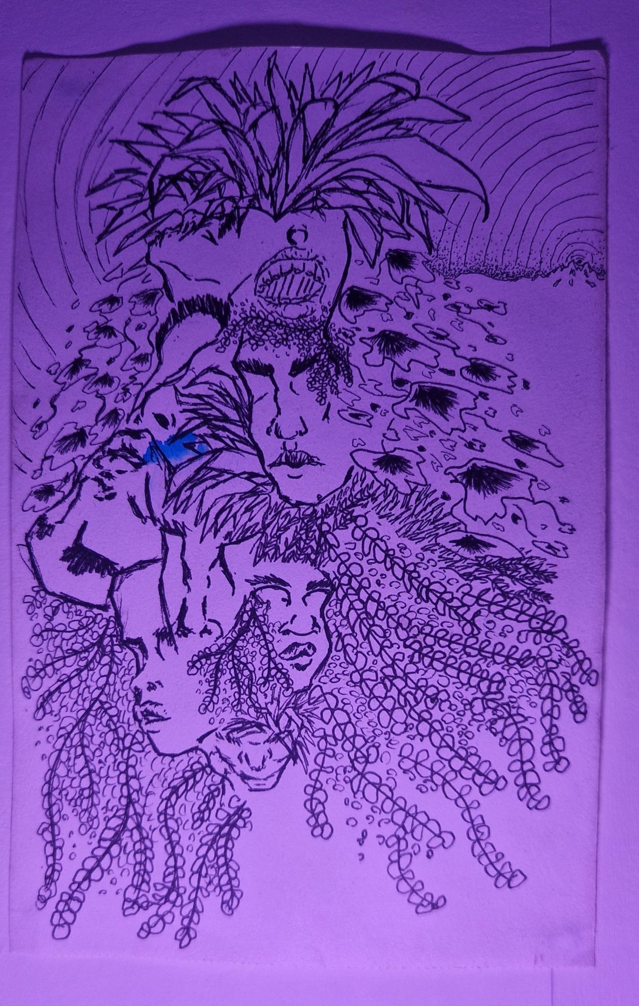 An explosion of plants and human faces.