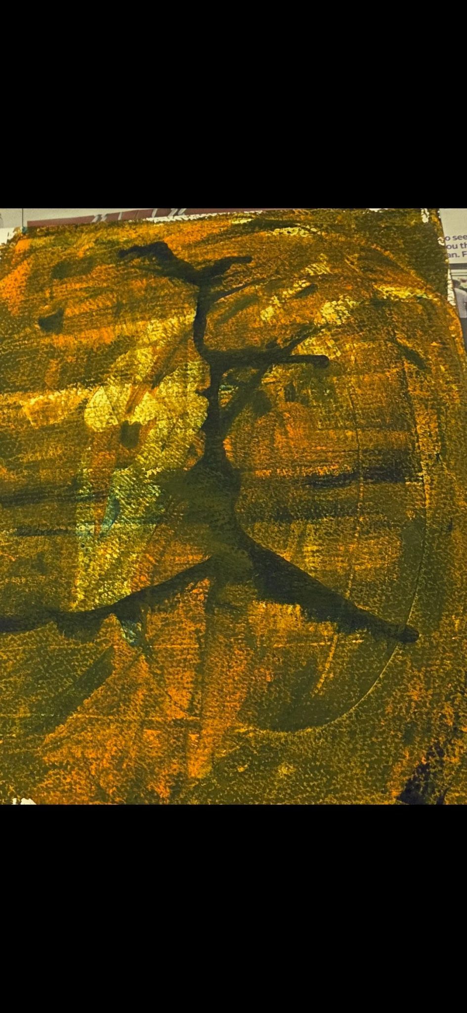 A tree stump surrounded by the dark earth