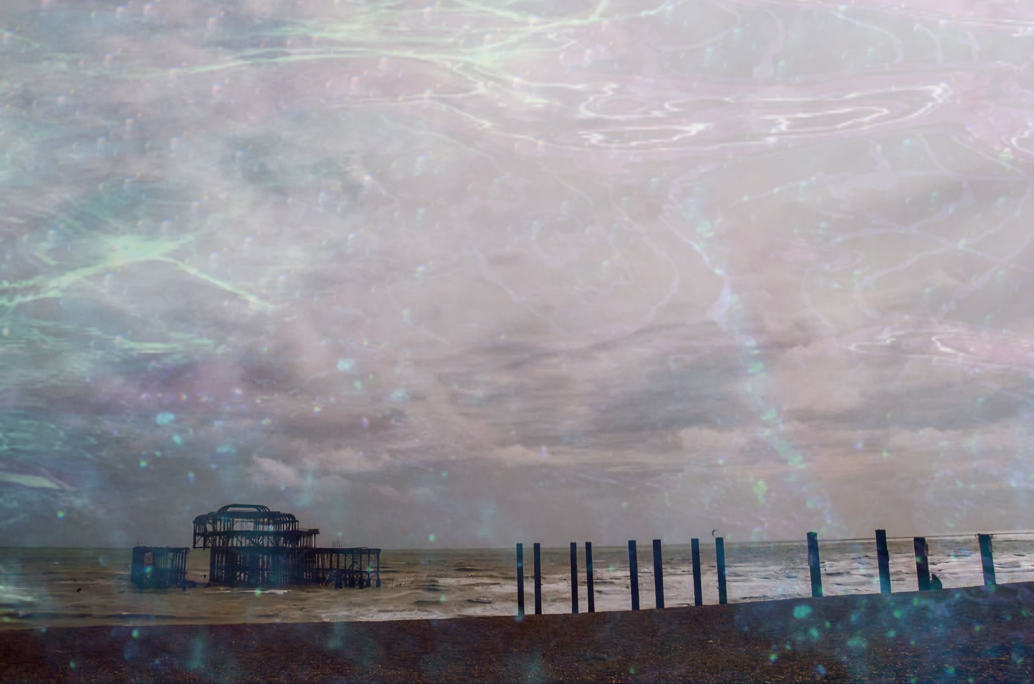 Film photo of Brighton beach incl burnt pier with iridescent overlay