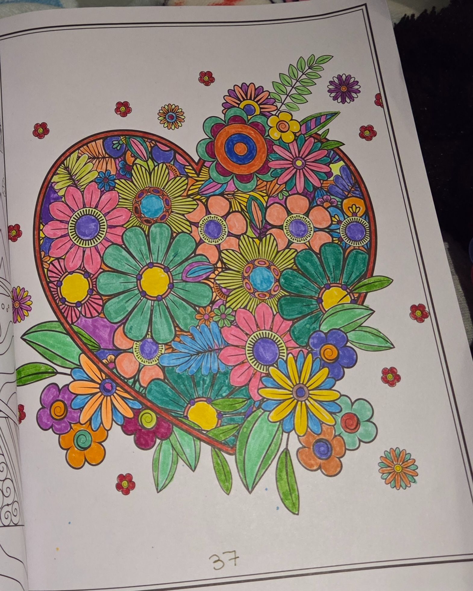 A heart full of flowers that was on page 37 of the colouring book.
