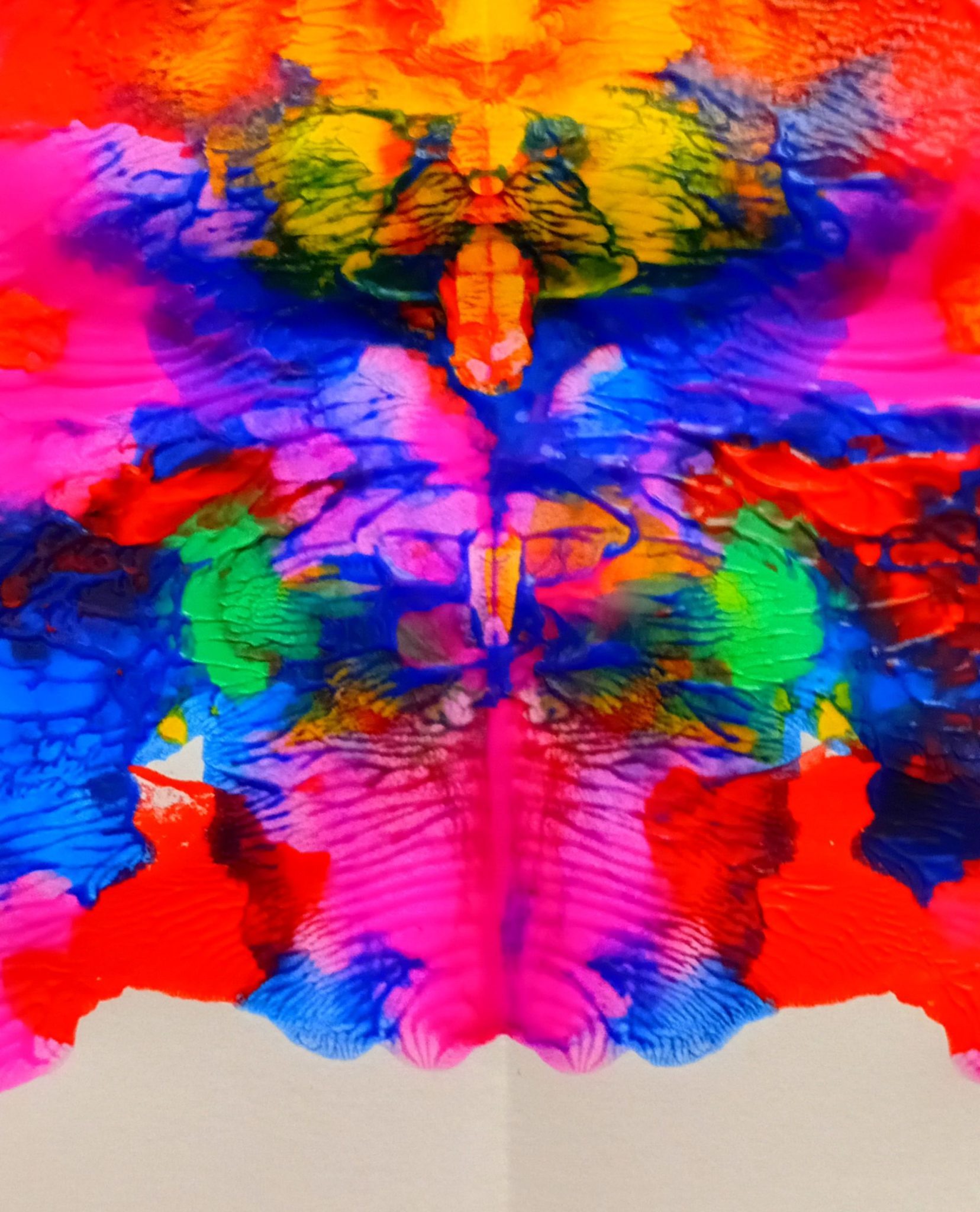 Abstract painting in pink, red, blue and yellow