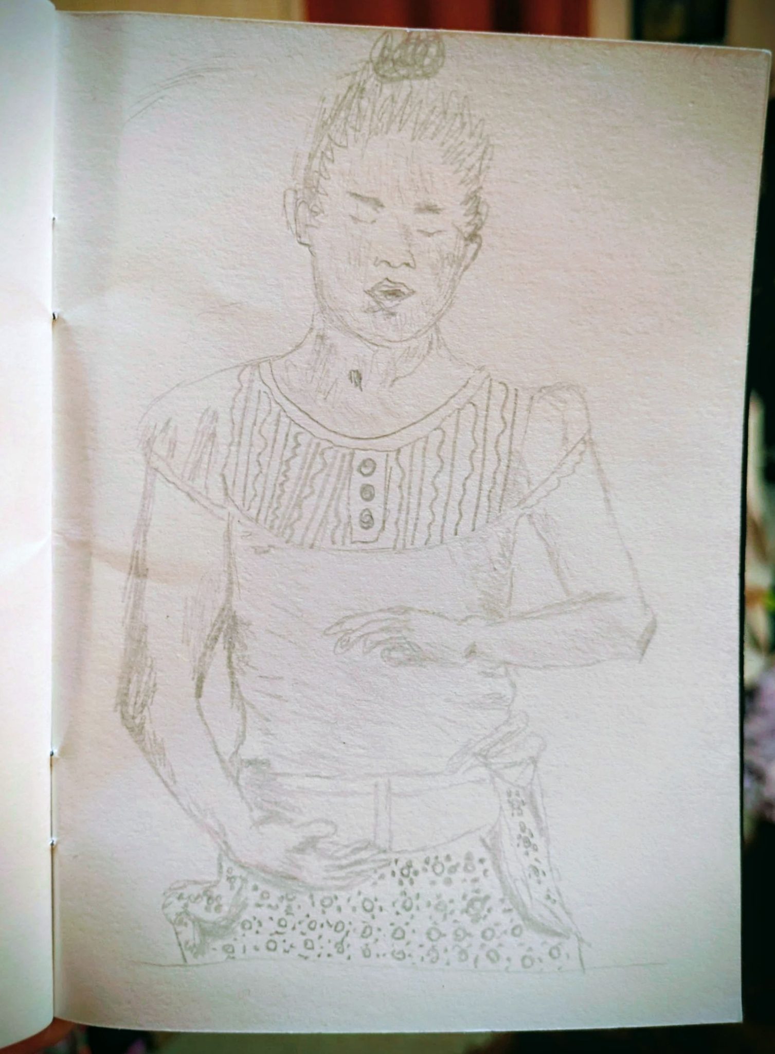 Sketch of a woman holding her arms as if around a ball