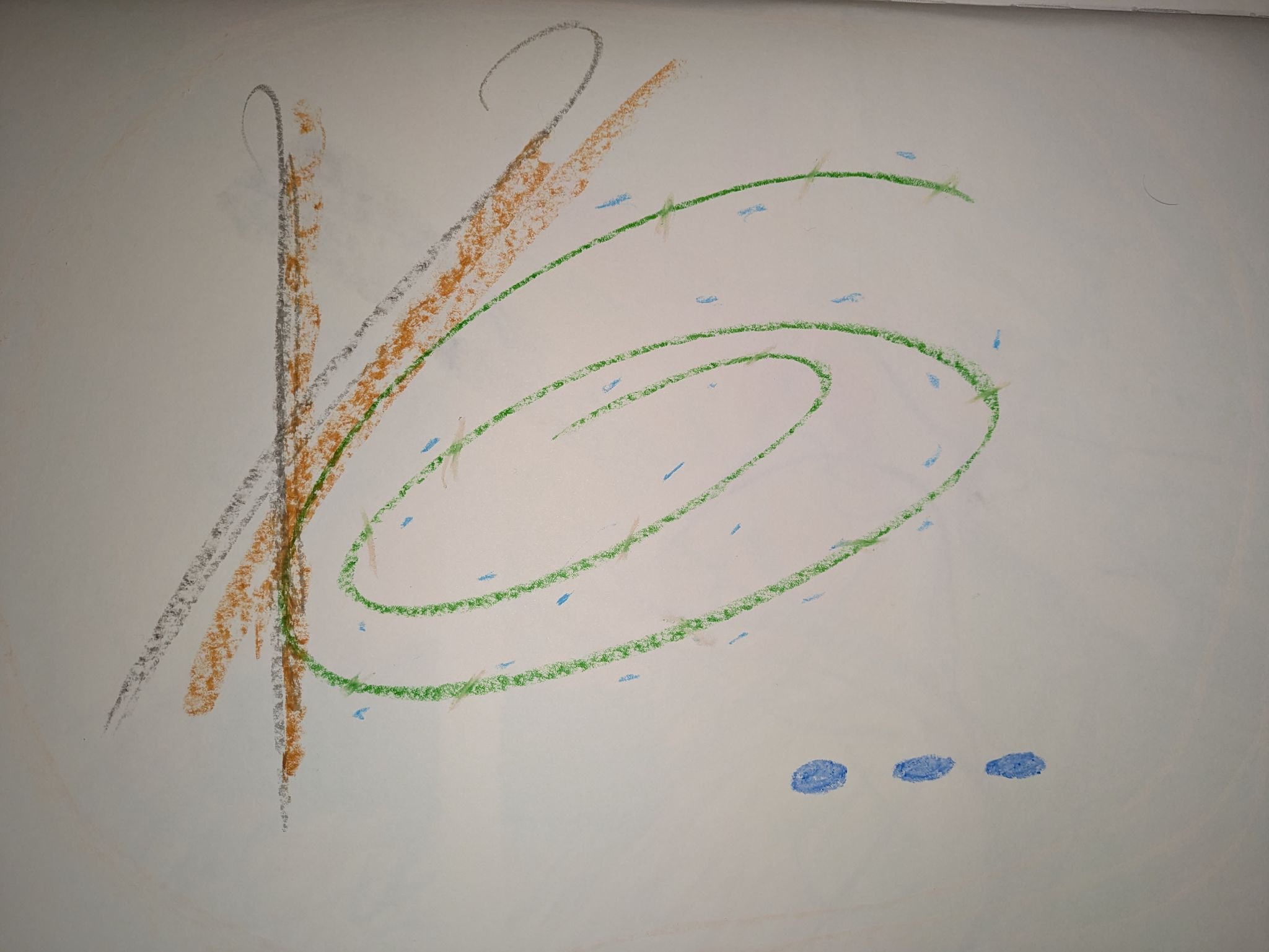 A few scribble in oil pastel on a white piece of paper