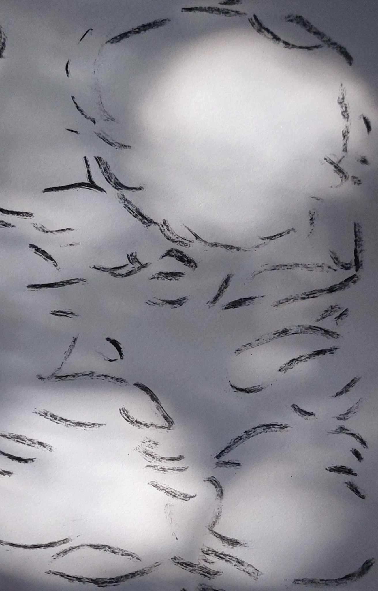 charcoal drawings around light