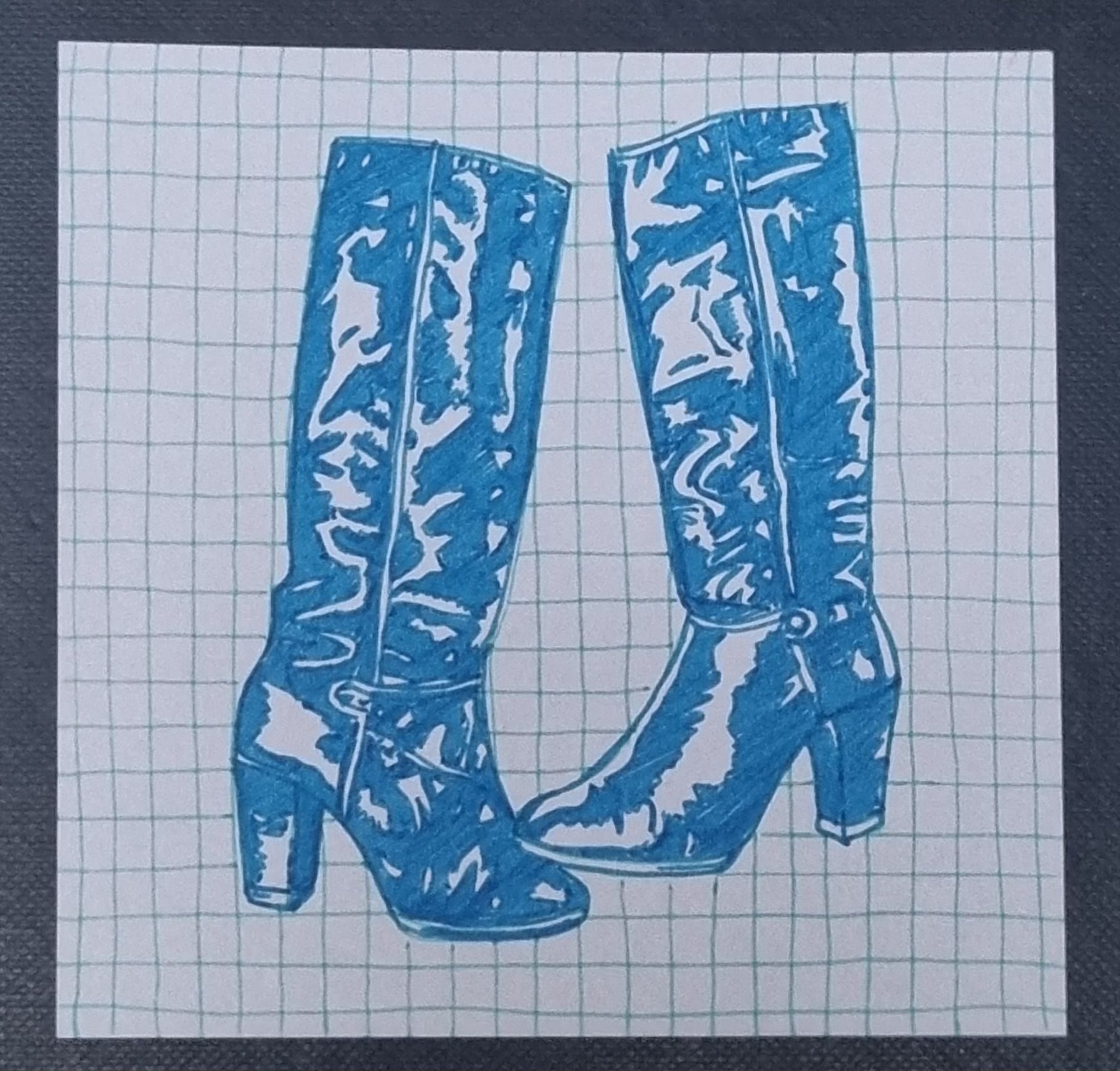 High contrast ink drawing of two blue boots on light aqua freehand grid background