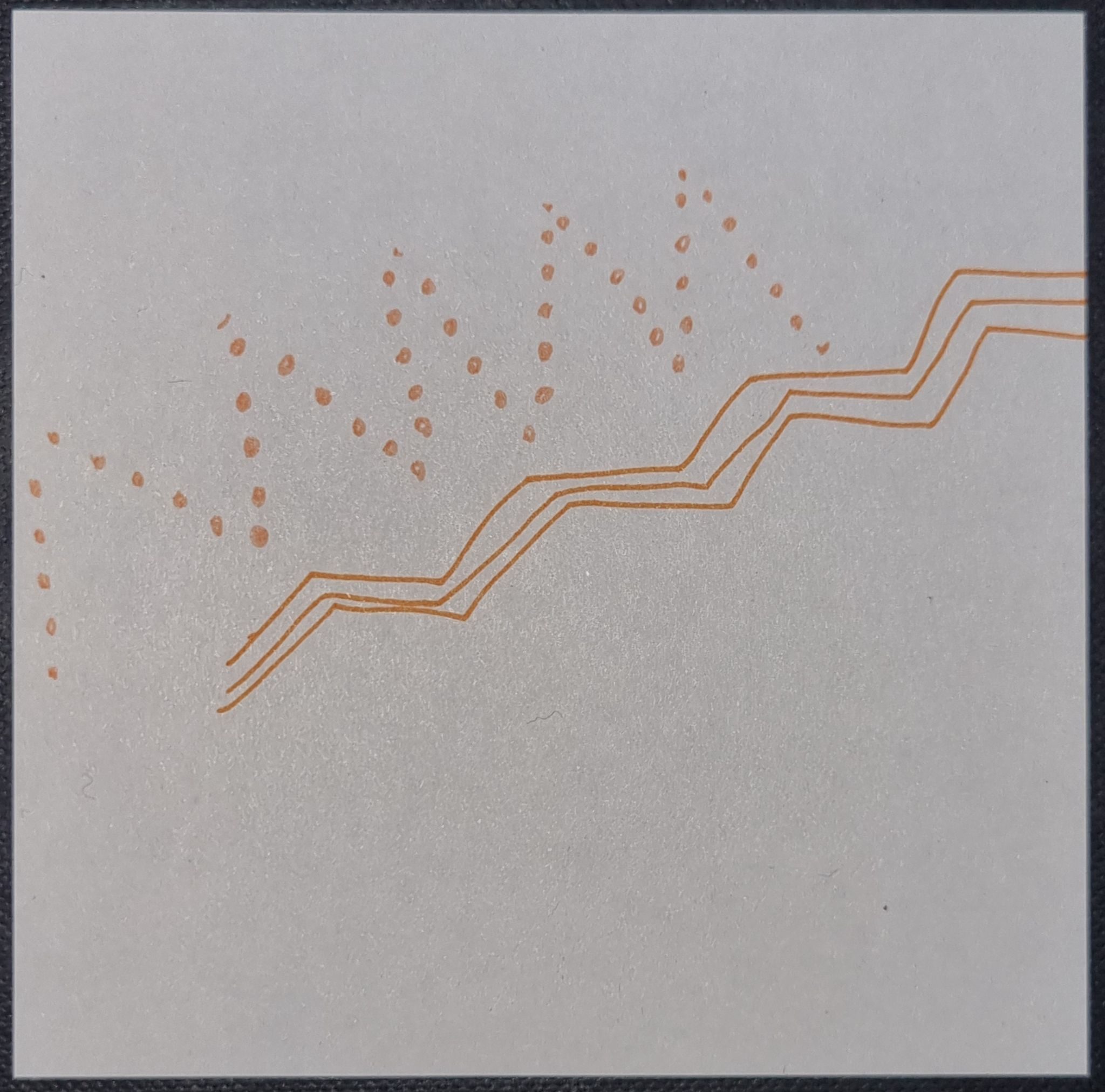 Peach dotted zig zag and wider orange zig zag line, on white square background.