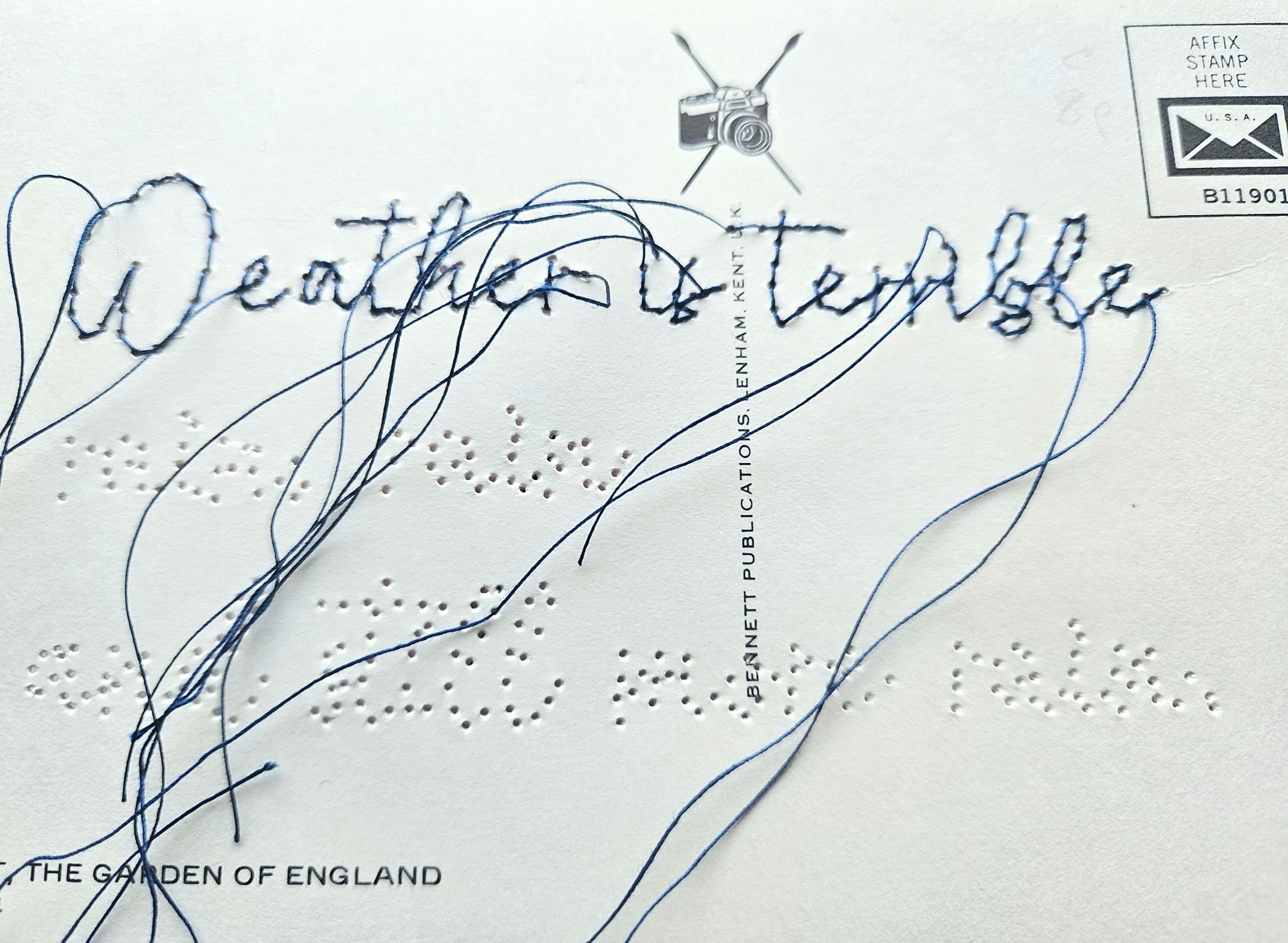 Sewn text on postcard