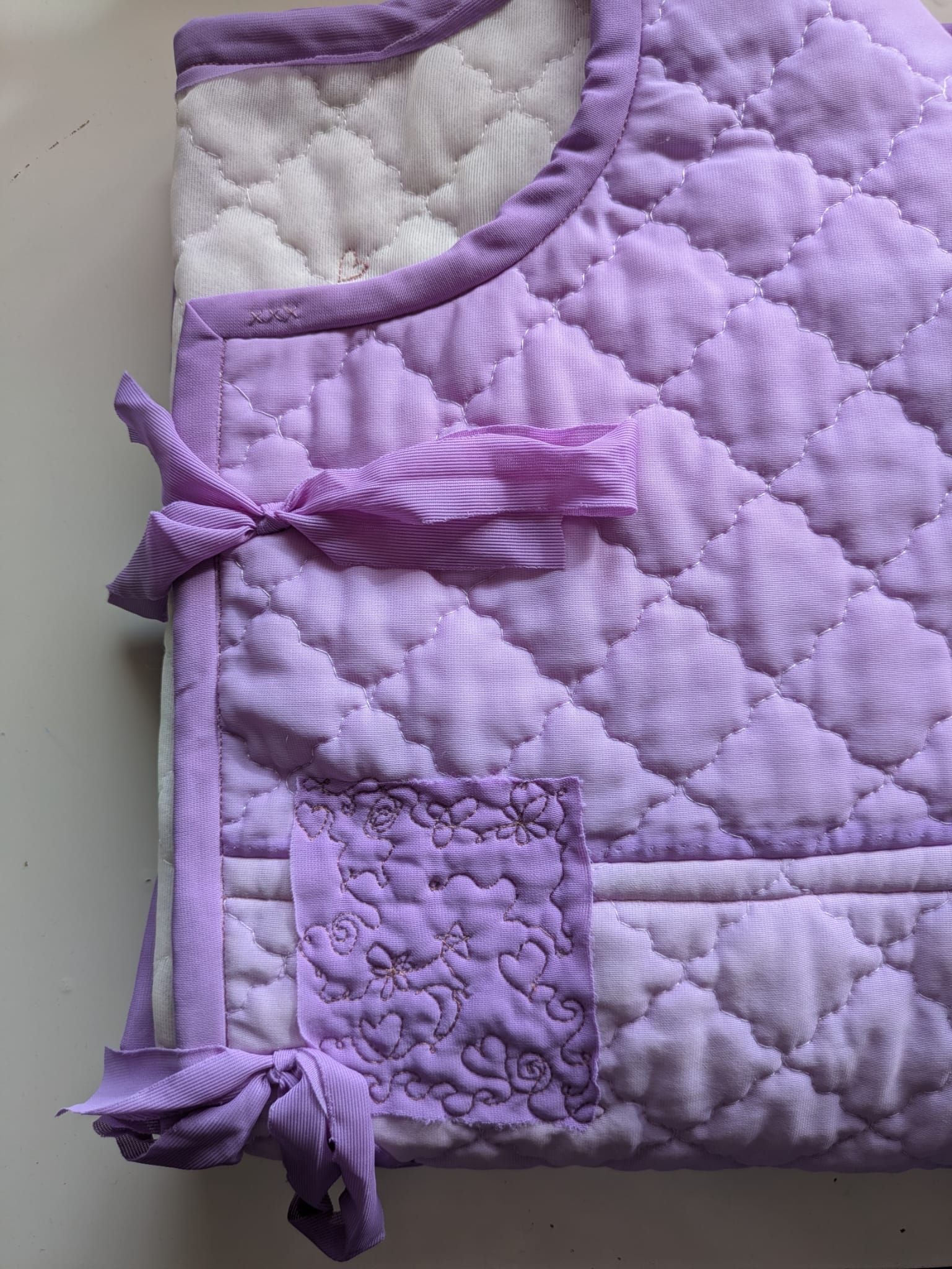 Photo of purple quilted jacket