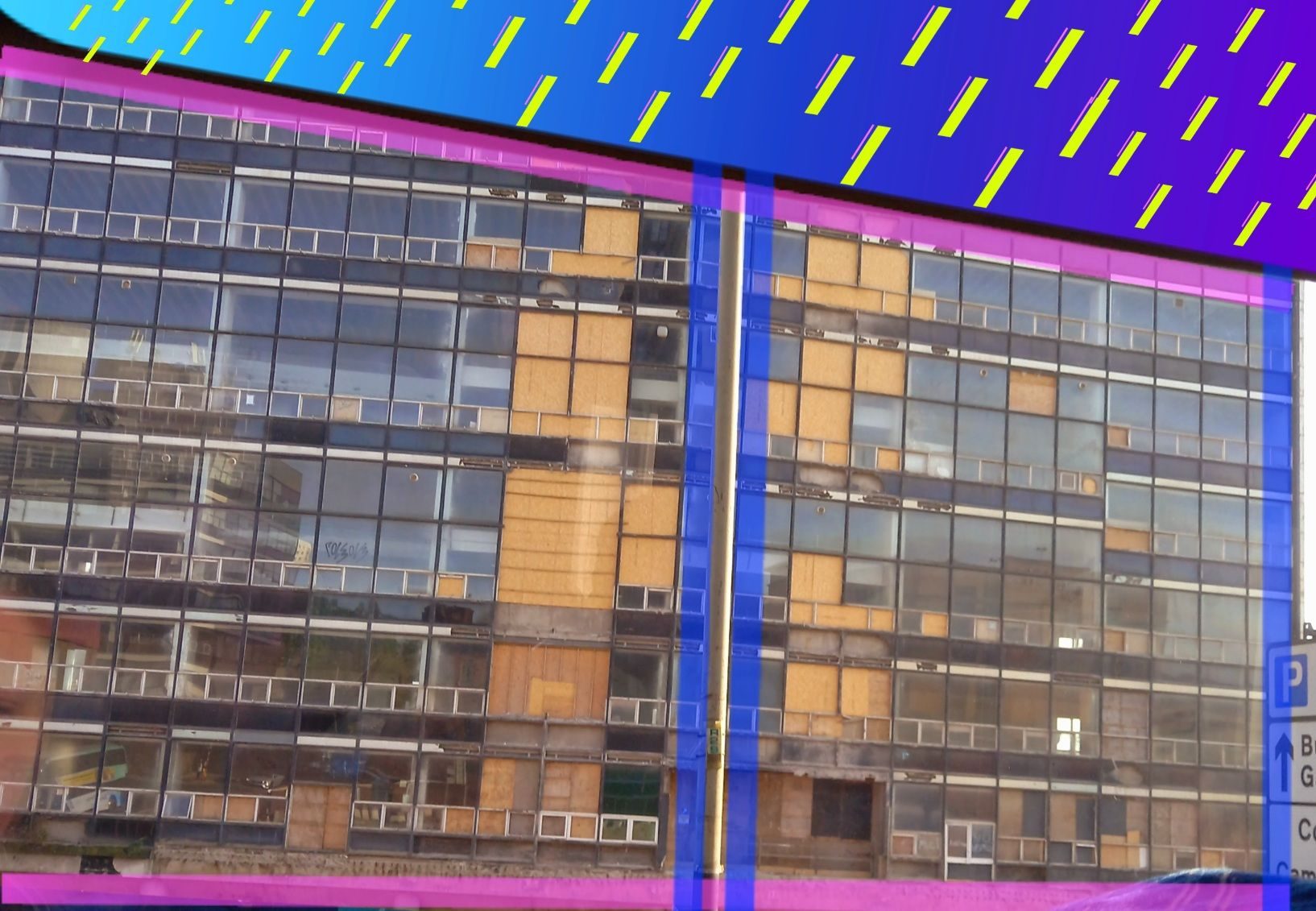 Derelict building with abstract neon overlay