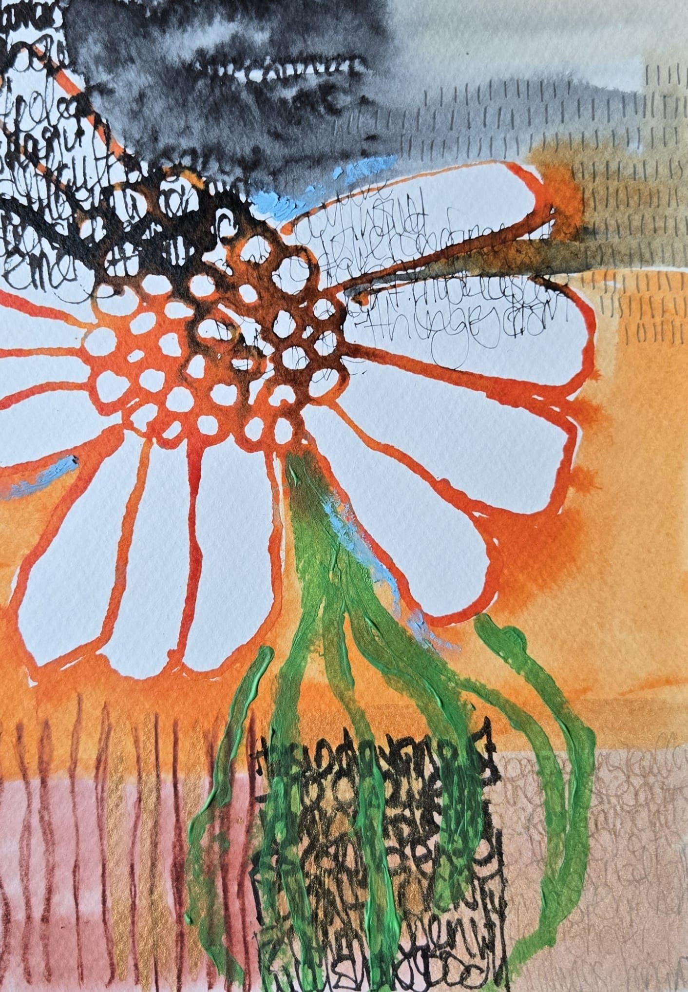 Mixed media artwork. The base is words, not eligible written with a black fountain pen over some of the page. Over it is a bold orange flower which has blurred the ink. It has some white petals for contrast.