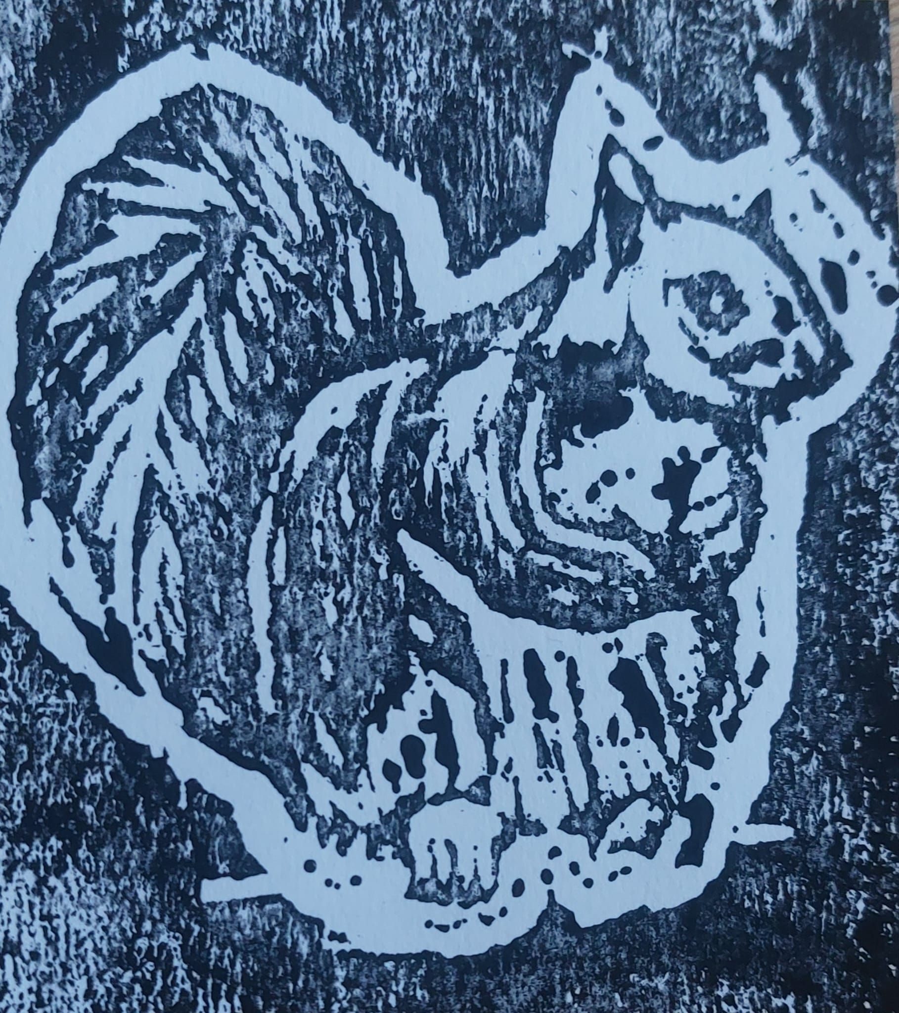 Woodprint of a squirrel, the print came out quite textured.