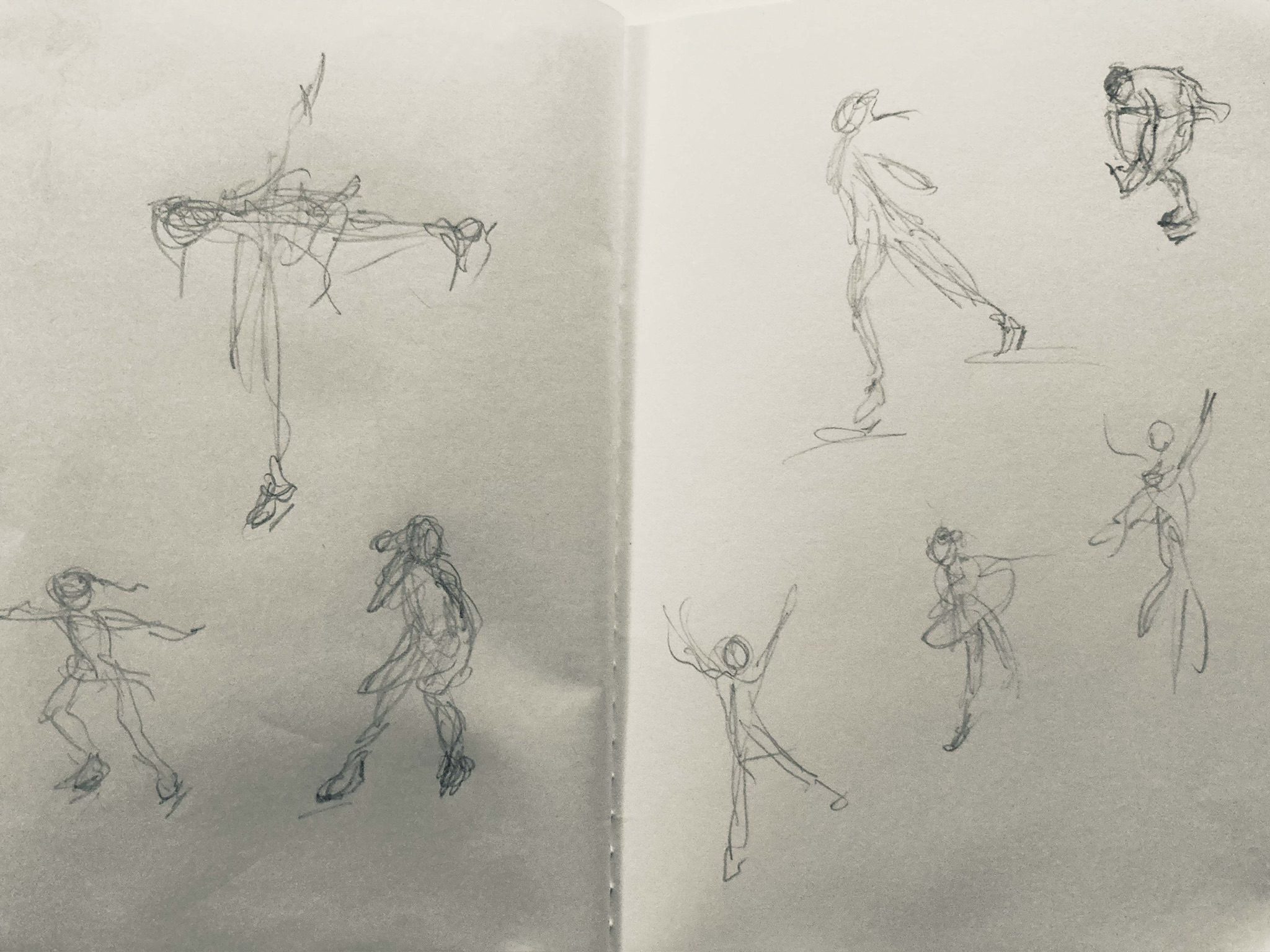 Sketches of ice skaters in pencil
