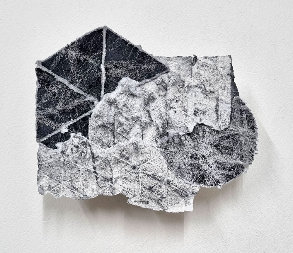 collaged drawing on paper