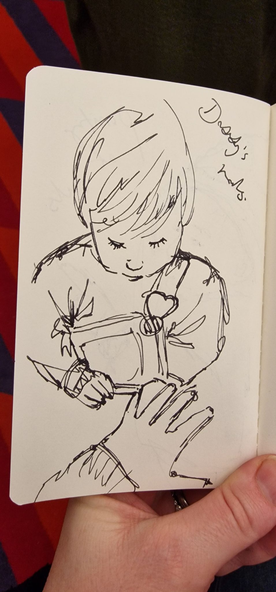 Pen drawing of toddler filing daddy's nails
