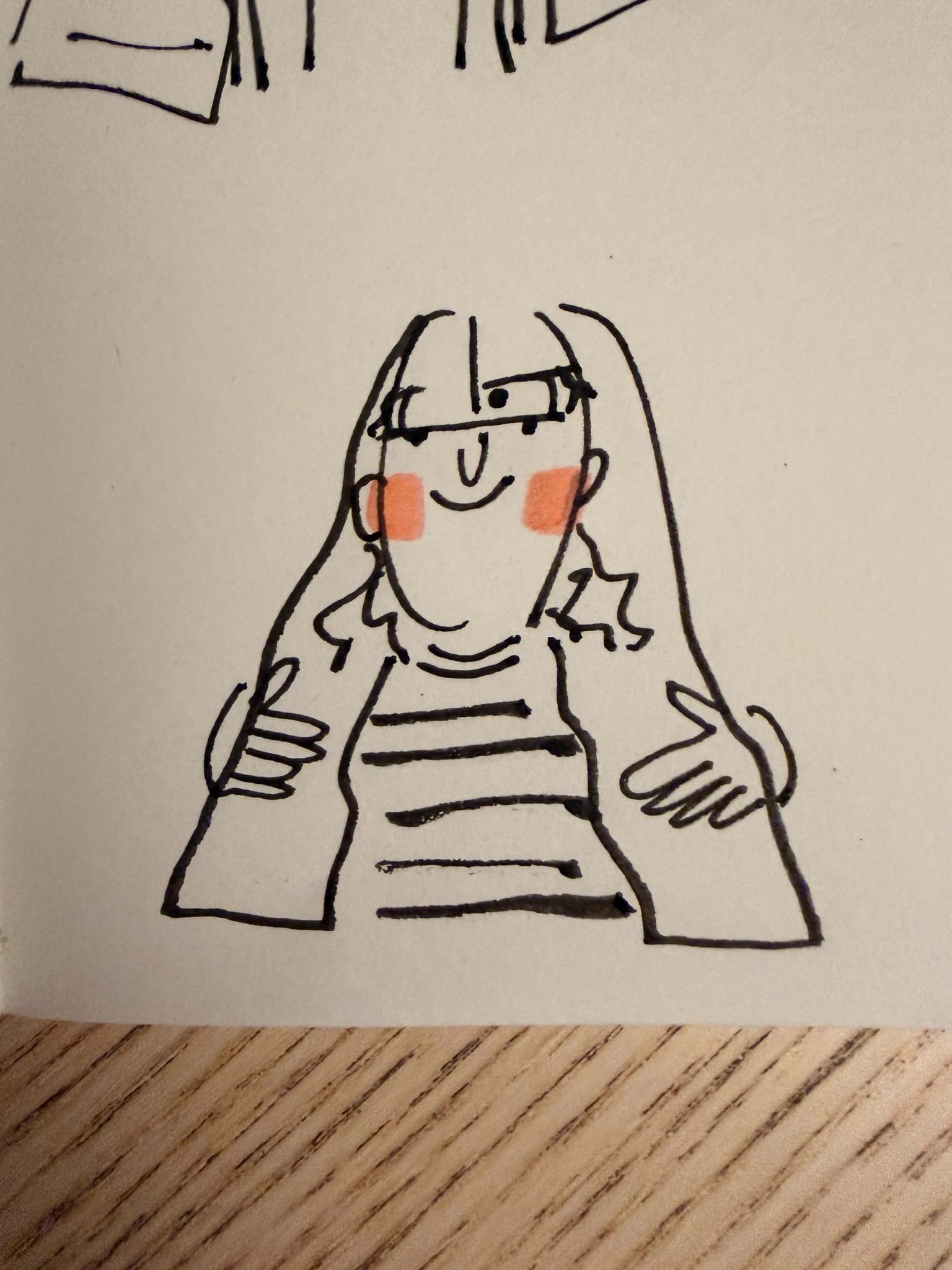 A girl with her trousers on her head. Black ink on paper.