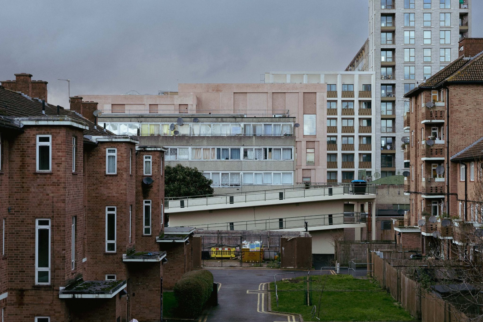 A small low rise block on Aylesbury estate surrounded by contemporary private developments