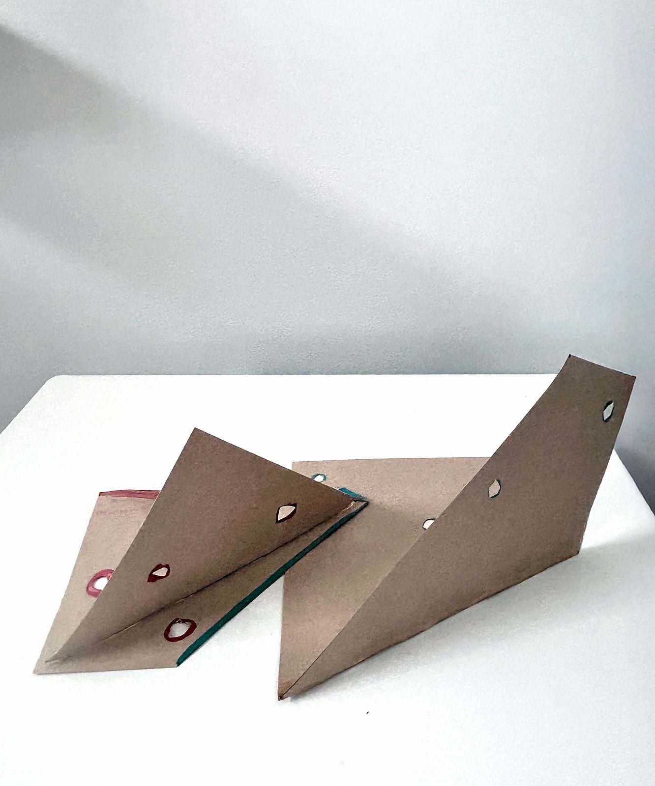cardboard shapes cut and glued together for imagined connectors