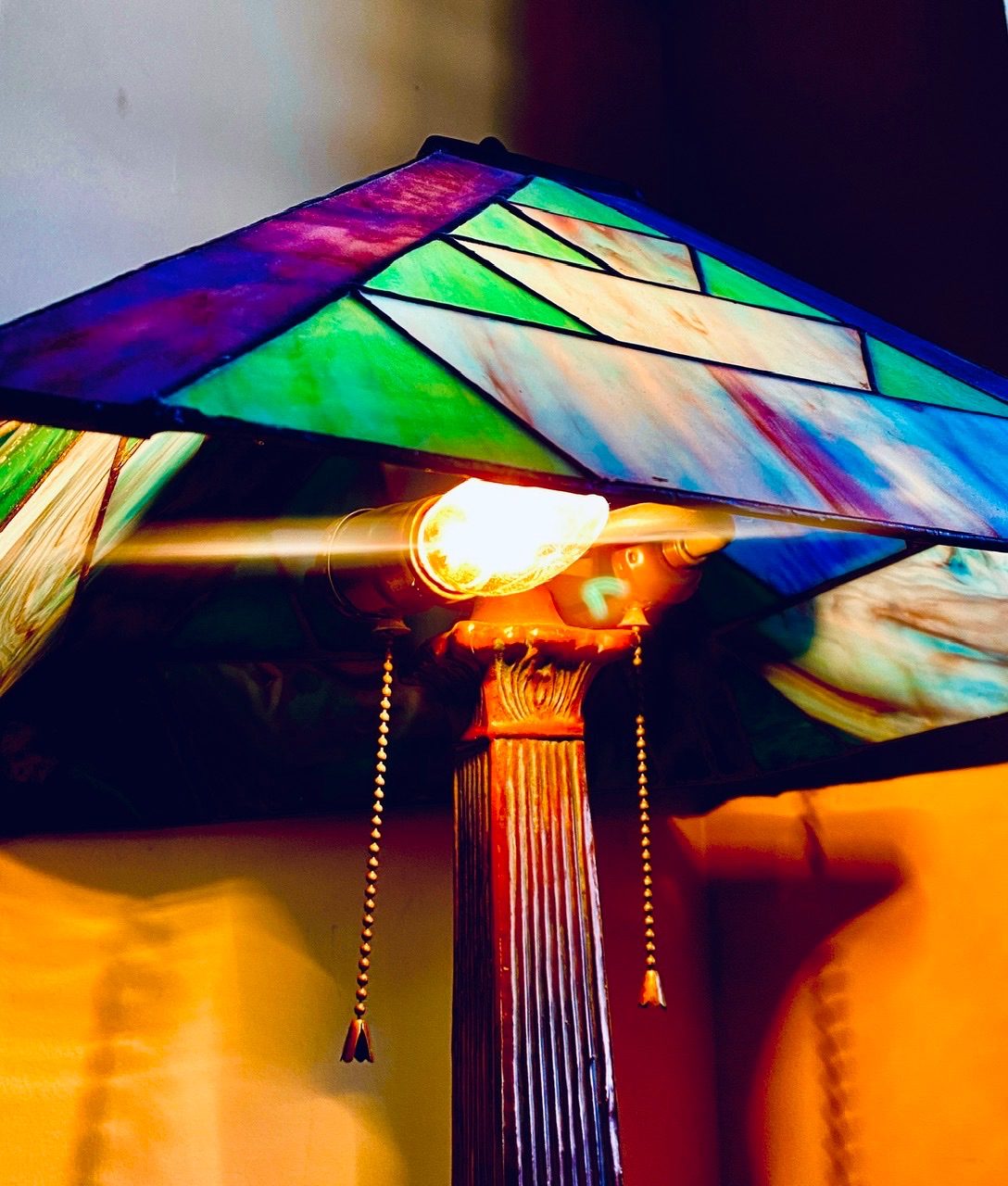 Photograph of a lamp with colourful stained glass