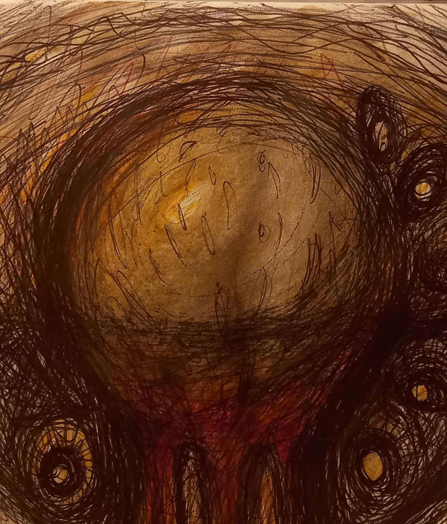 Small black biro and watercolour drawing mainly black, red and  brown. One large central sphere surrounded by small orb like structures.  This is a detail of the piece.