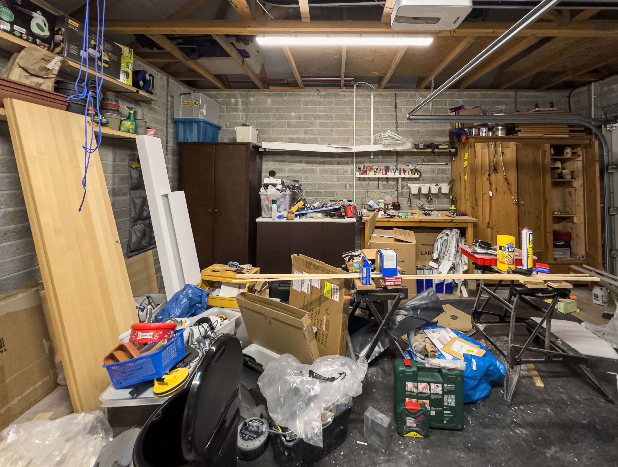 A photograph of a messy and chaotic work space