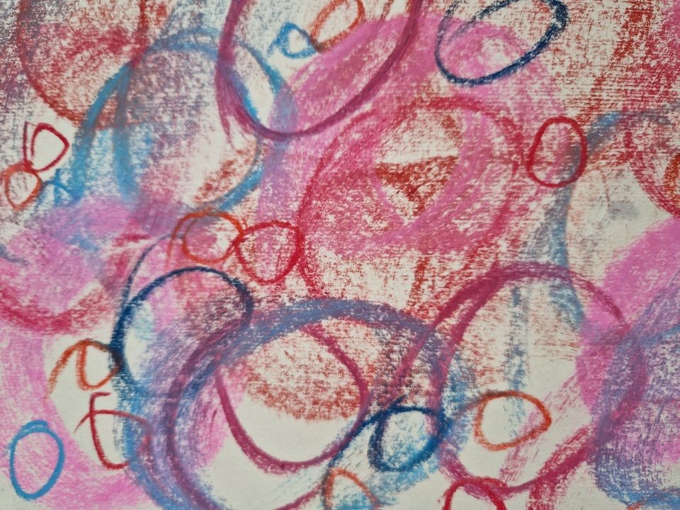 Randomly drawn circles in red and blue pastel circles