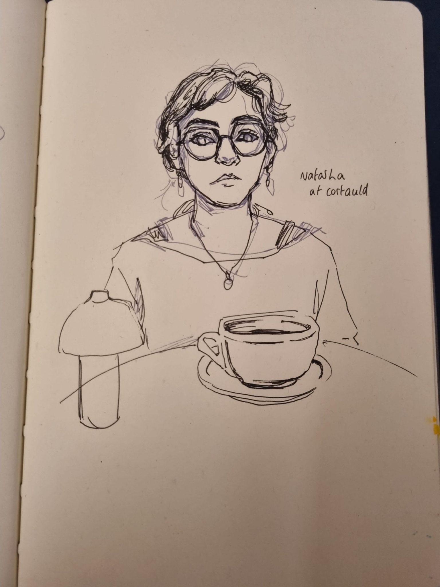 A sketch of my friend in a cafe