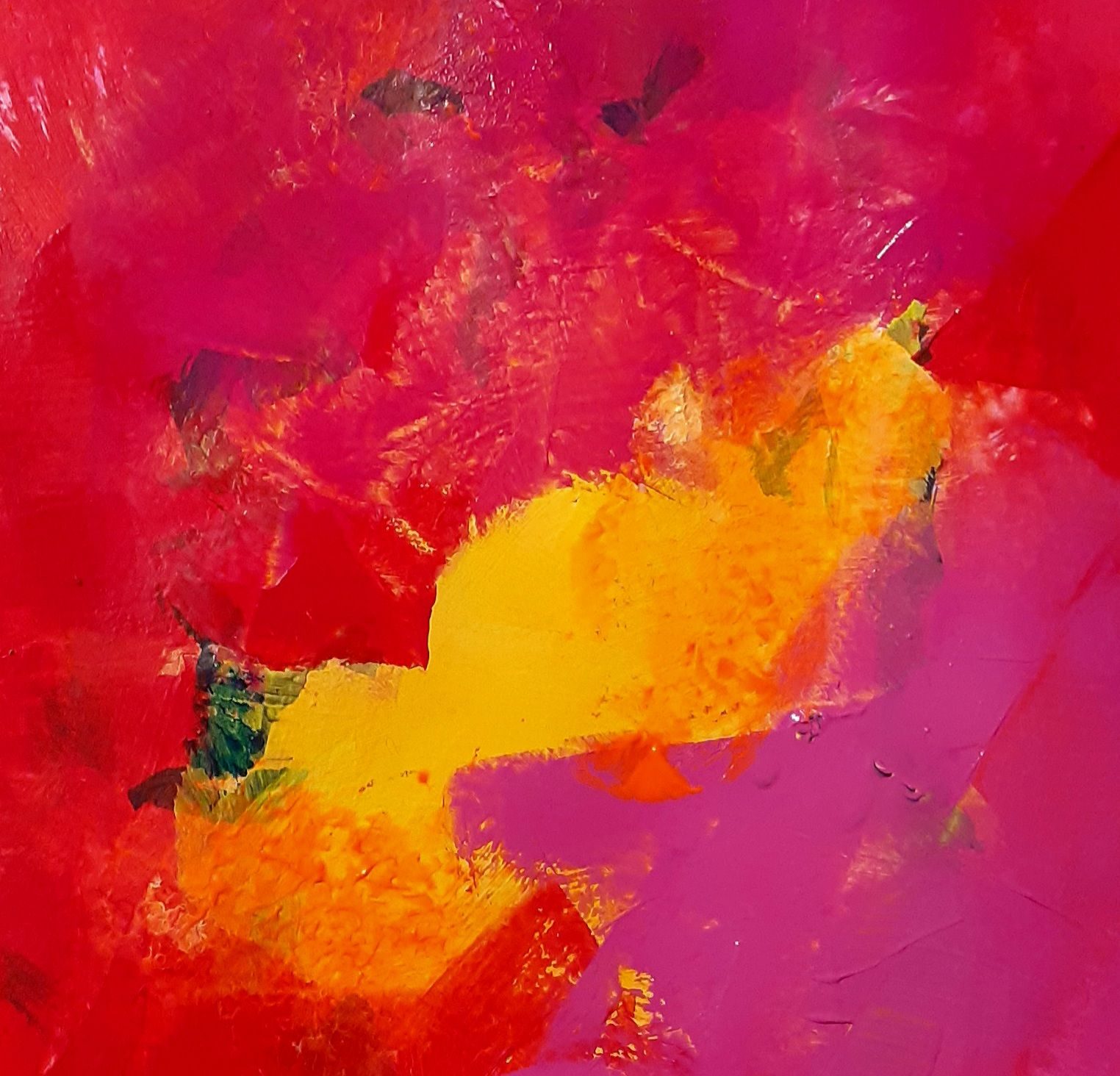 Abstract acrylic painting in reds a magenta with a splash of yellow