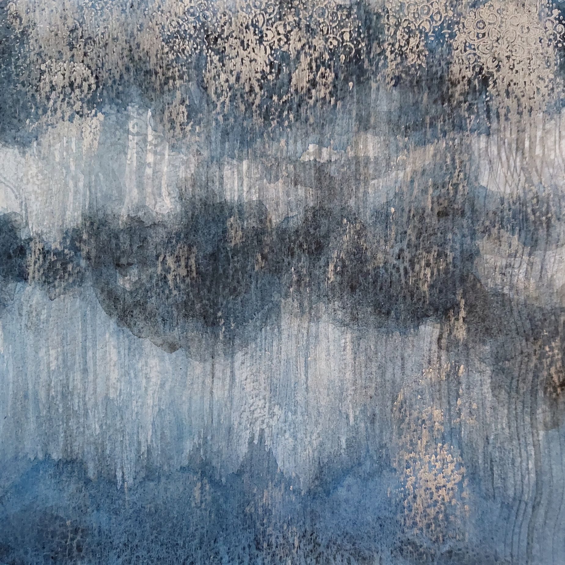 Using several light-reflecting layers to create the sense of a weathered surface in shades of light to intense indigo, with a final application of delicate, silver motifs like lace curtains across a misted window