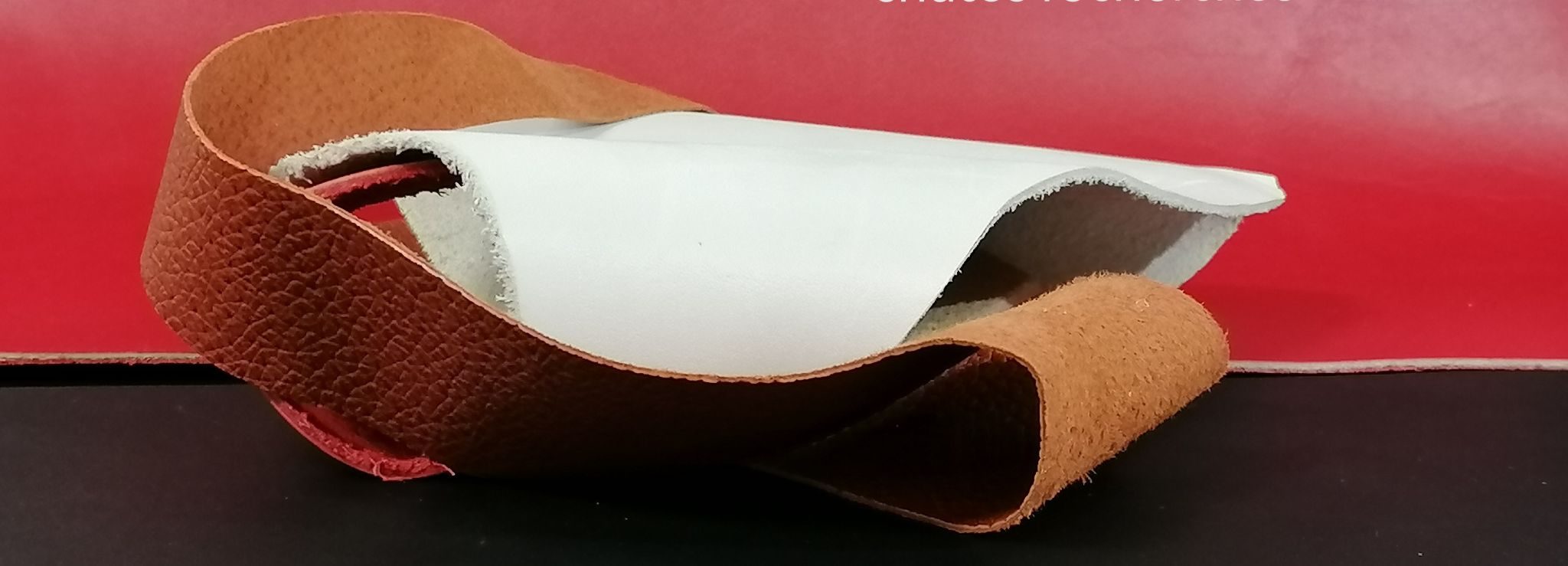 Folding several small leather pieces together