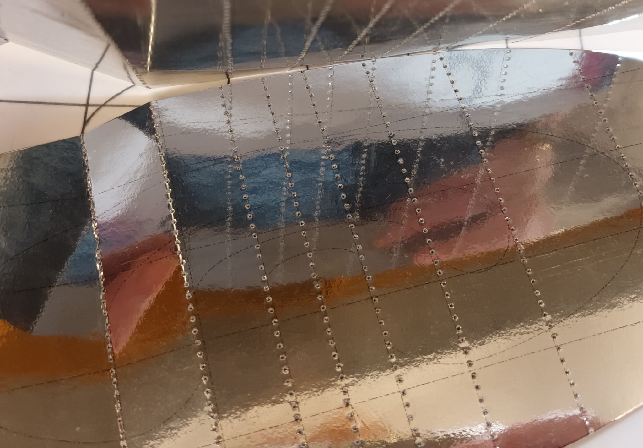 Reflected light, perforated mirror card, detail