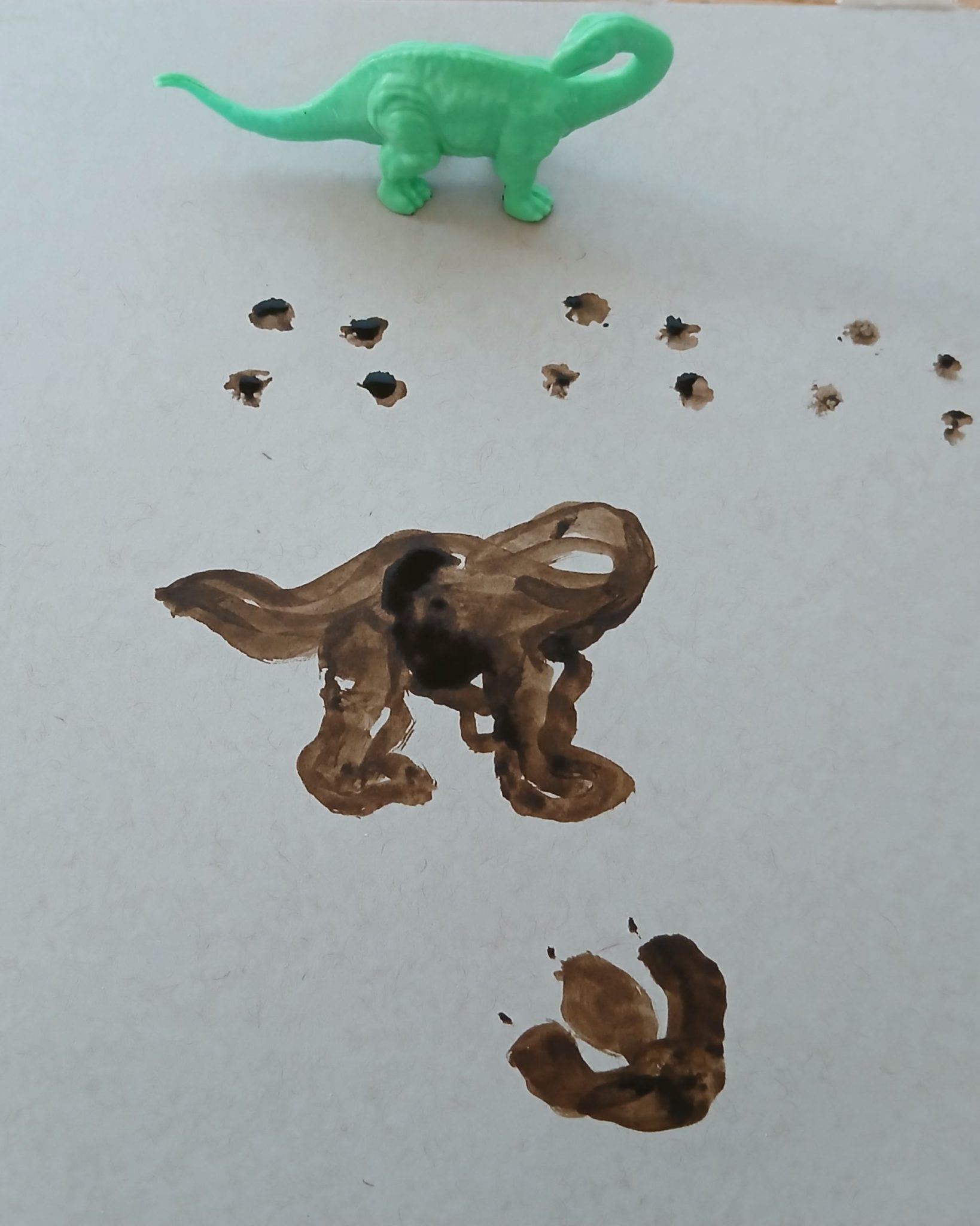 Dinosaur from Colton with small painting