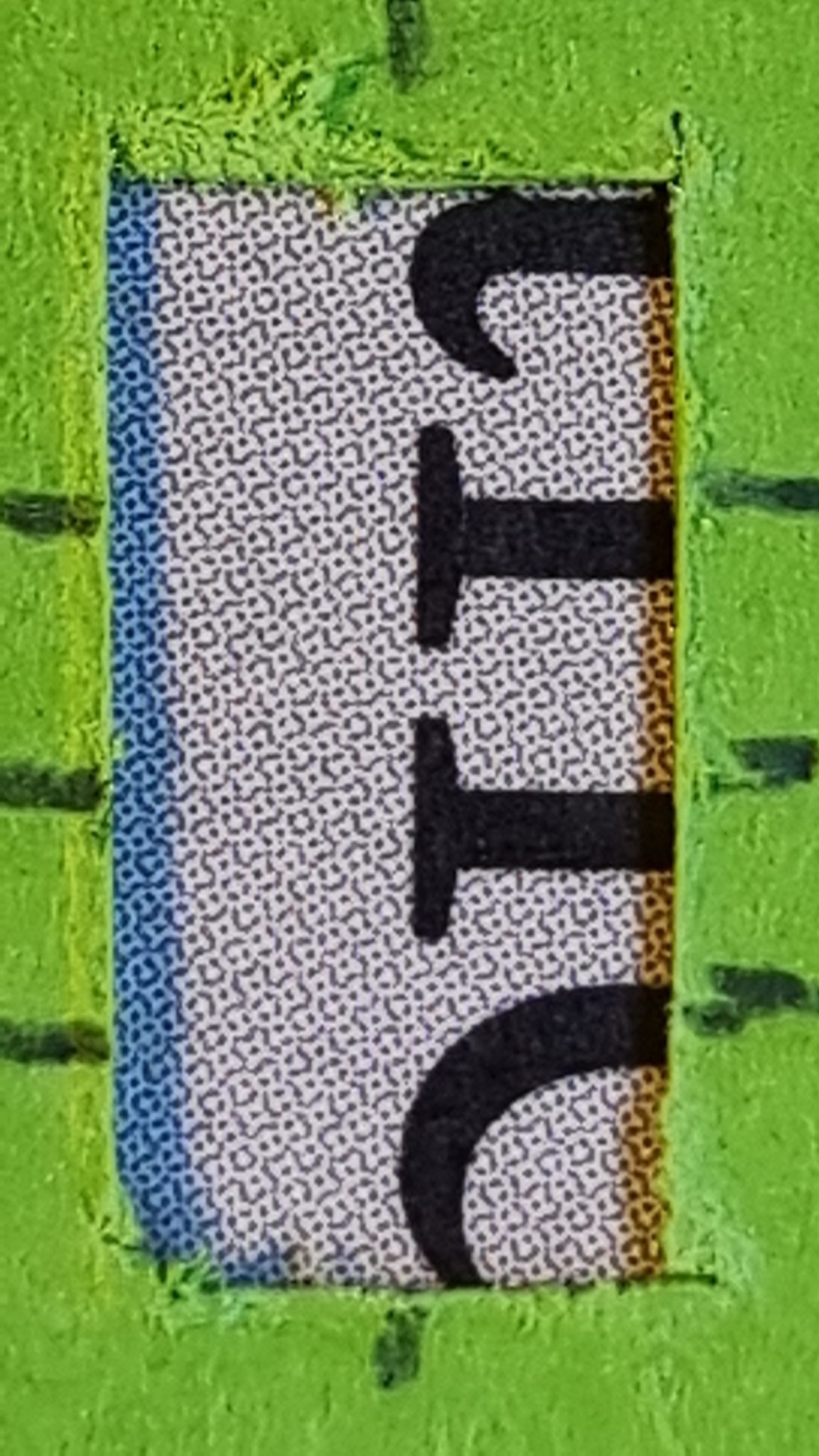 Photograph of the lower parts of the letters 