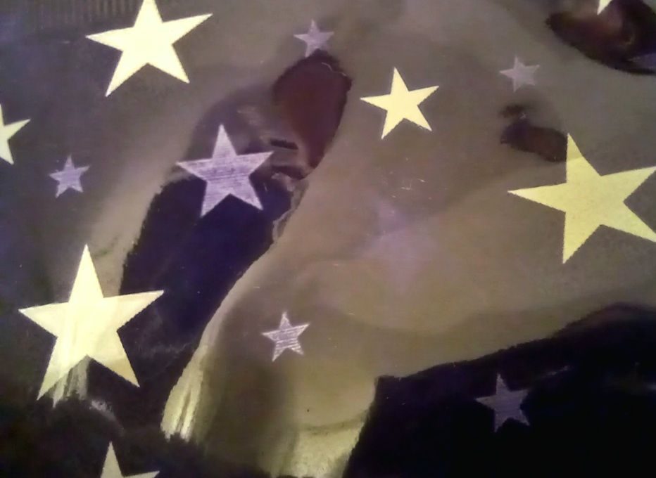 Photograph of stars and abstract, blurry shapes.