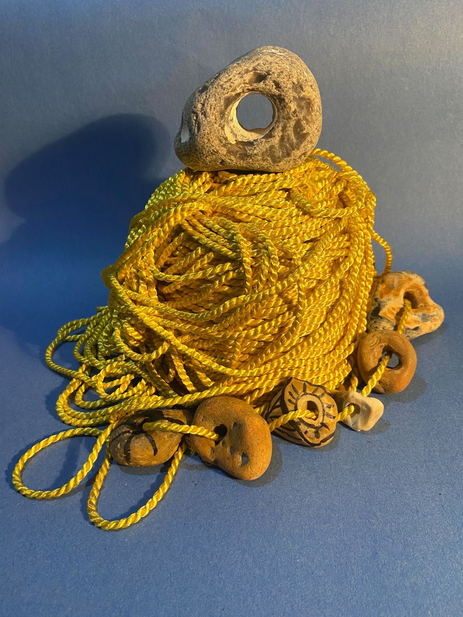 a large hagstone has made its way to the top of the golden chord mountain - six smaller hagstones have been harnessed by the chord