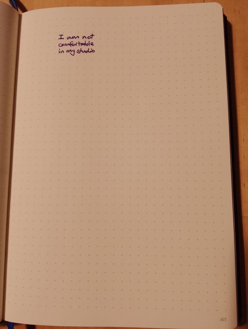 A photograph of page 41 of a dotted grid A5 notebook page. At the top left of the page, handwritten in purple ink are the words 