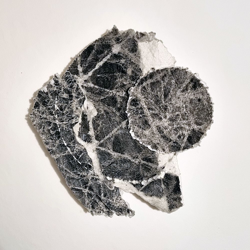 collaged drawing on paper