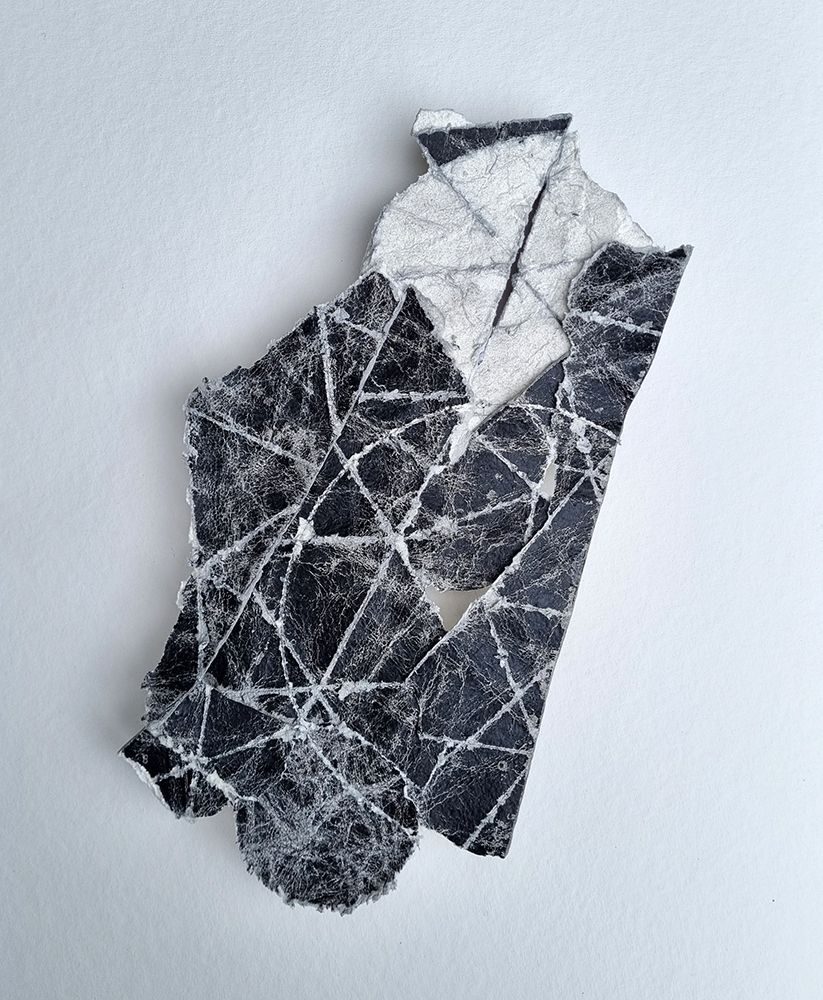 collaged drawing on paper