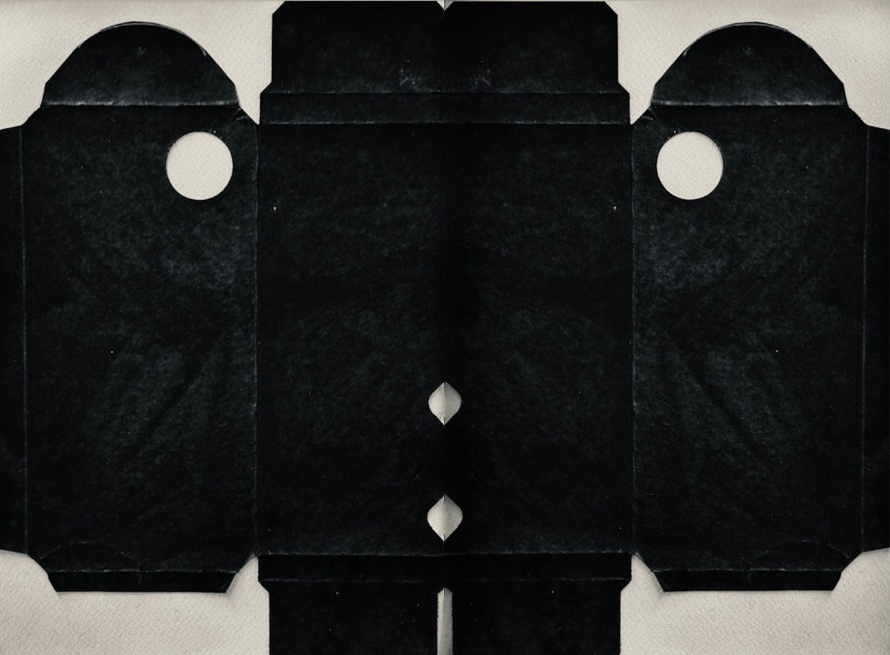 edited photo of tonic water multipak cover painted black