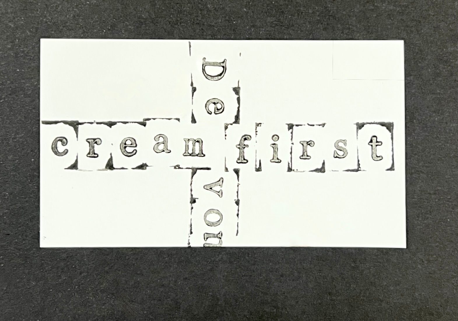 cream first and devon printed in black