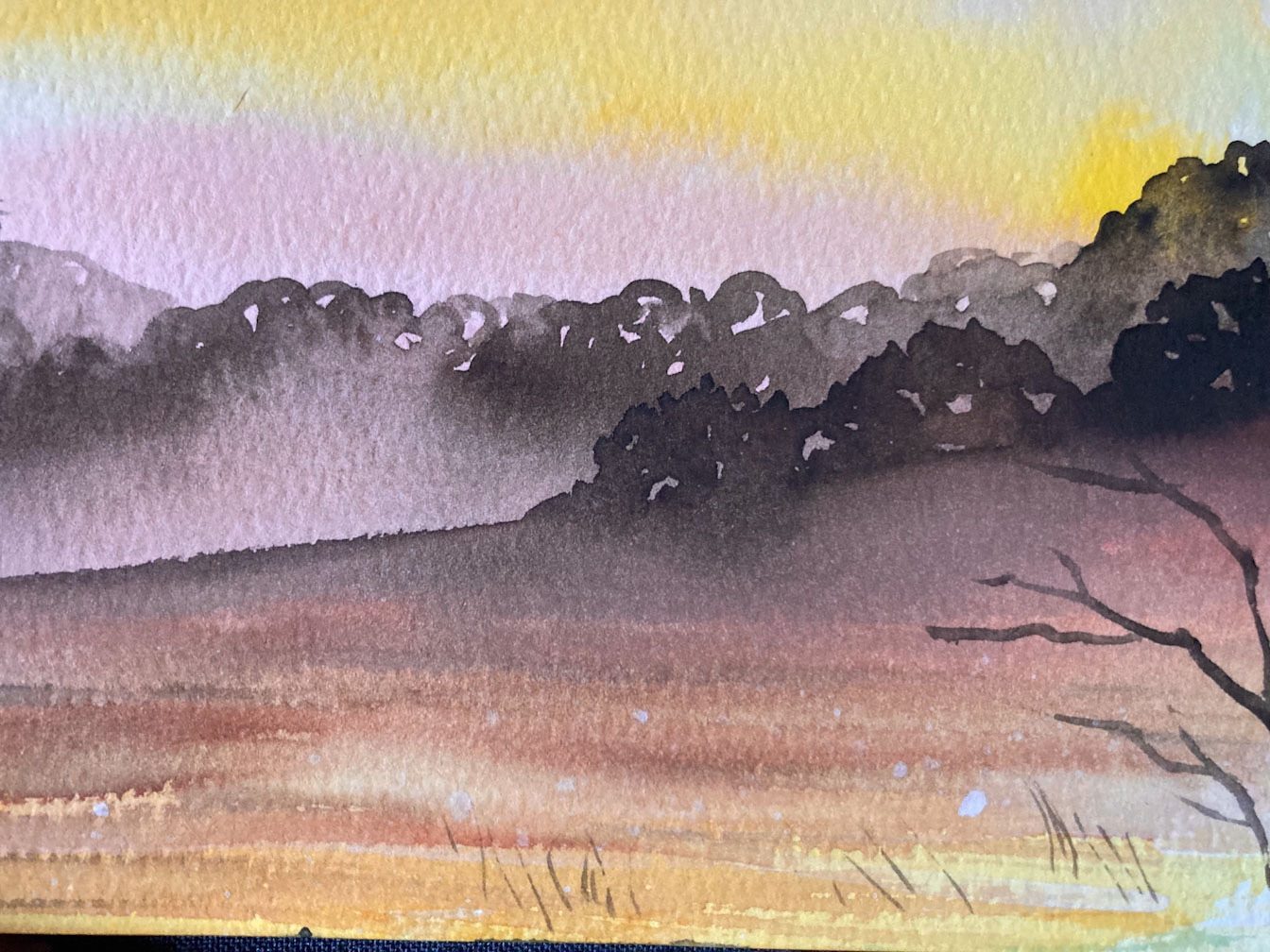 Landscape in brown, burnt sienna and yellow watercolour layers